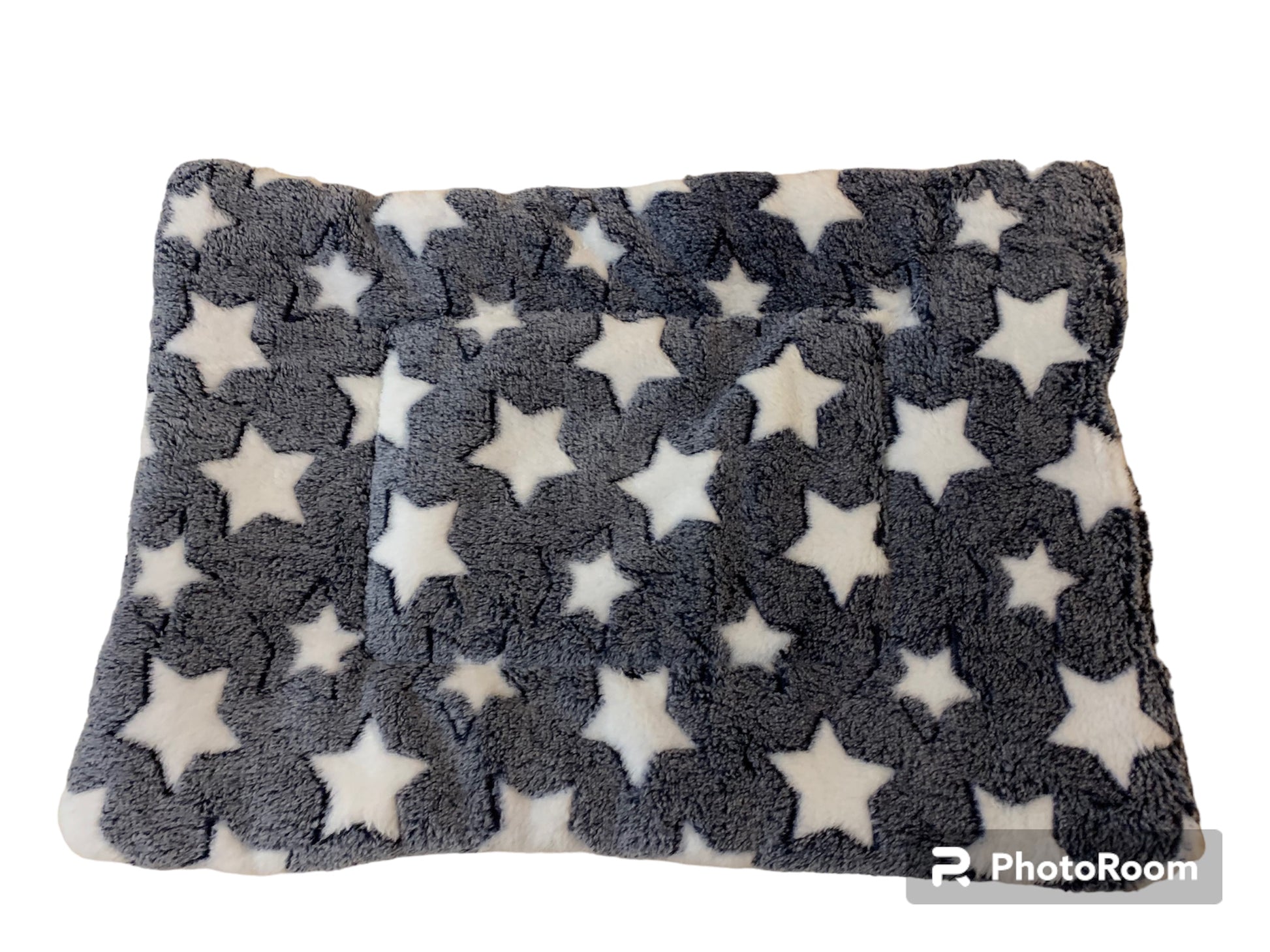 Flannel blanket with star pattern on a white background